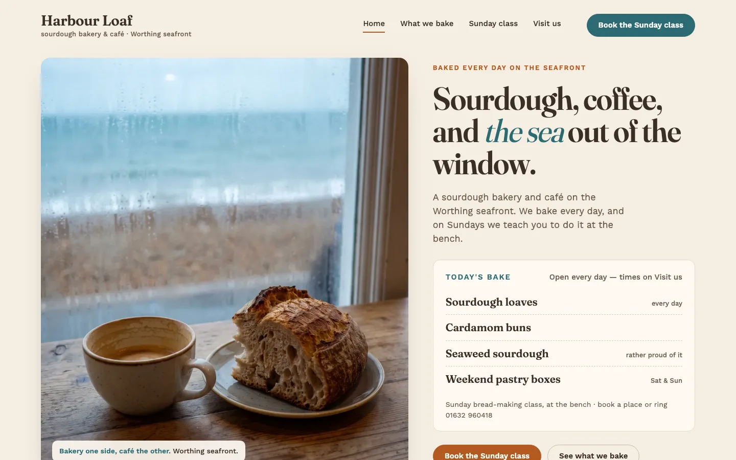 The Window seat direction: Sourdough, coffee, and the sea out of the window, on a warm sand ground, a photograph of coffee and a loaf at a rainy seafront window beside today's bake on a café menu card