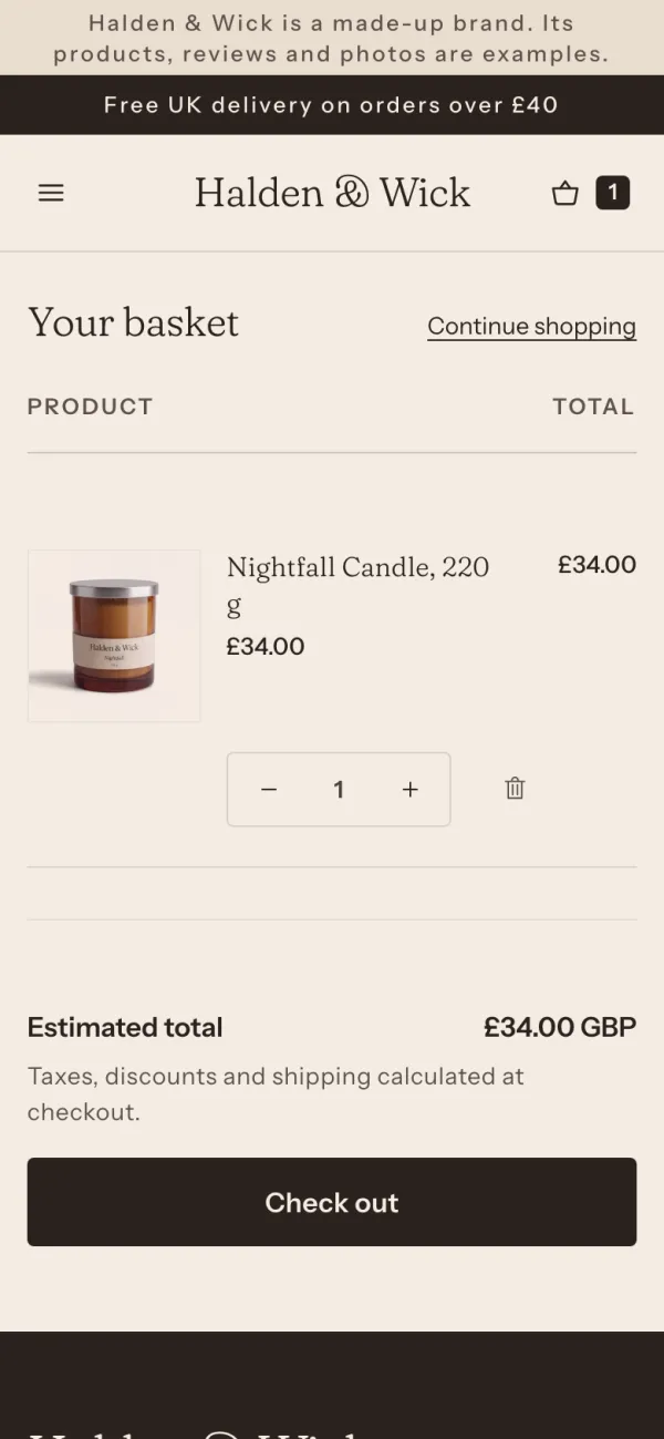 Phone screen of the Halden & Wick store: the basket, with one candle in it, the first screen.
