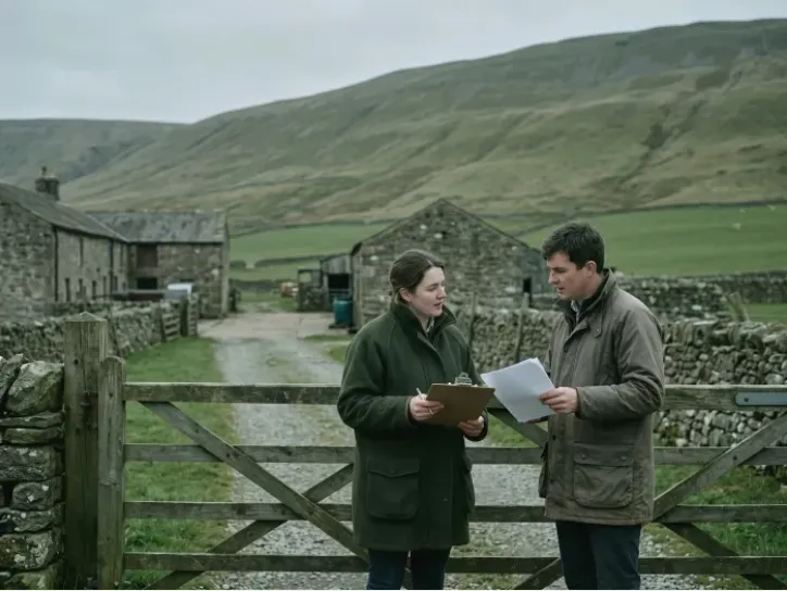 Generated illustration of fictional partners Ellie Rowan and Tom Beck at a farm gate, captured from our example build.