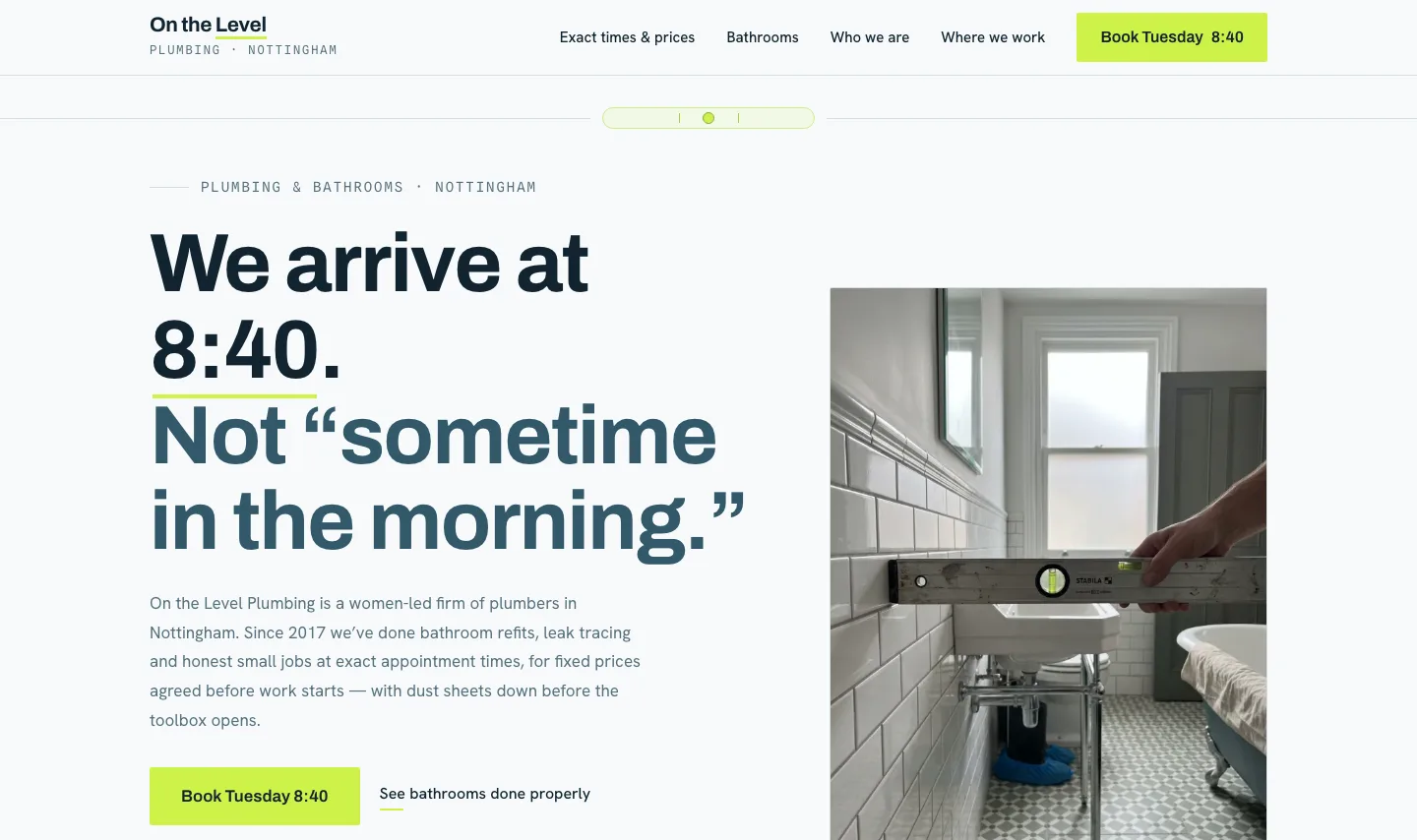 On the Level example website opening: an exact appointment headline and booking route. The desktop view also shows a spirit level in a newly fitted bathroom.